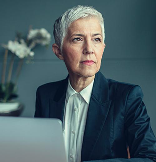 stoic businesswoman and computer